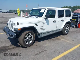 2018 Jeep Wrangler Unlimited Sahara with VIN 1C4HJXEG6JW112976, listed as a IAAI auction lot 42559123 with 76,066 mi miles and . Bid and sale history available at DreamBid. Image 18.