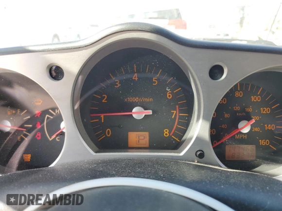 2004 Nissan 350Z Enthusiast z VIN JN1AZ36A74T015422, wystawiony jako Copart lot #77537194 z przebiegiem 147 466 mil mil oraz Nie do naprawy • Non repairable. Historia ofert i sprzedaży dostępna na DreamBid. Obrazek 9.