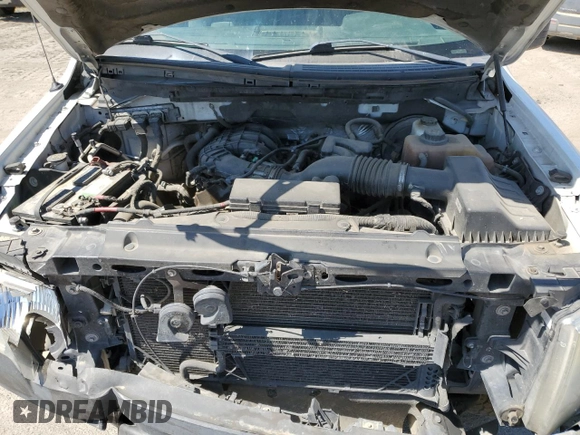 2013 Ford F-150 XL с VIN 1FTEX1CM5DFC43358, выставлен на аукционе Copart как лот 57184265 с пробегом 346 103 миль миль и Списание • Salvage title. История ставок и продаж доступна на DreamBid. Изображение 11.