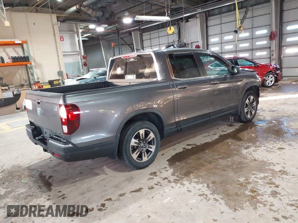 2019 Honda Ridgeline RTL with VIN 5FPYK2F54KB005791, listed as a IAAI auction lot 41285980 with 49,729 mi miles and . Bid and sale history available at DreamBid. Image 4.