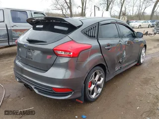 2015 Ford Focus ST with VIN 1FADP3L93FL321830, listed as a IAAI auction lot 41835529 with 106,901 mi miles. Bid and sale history available at carsss.com. Image 4.
