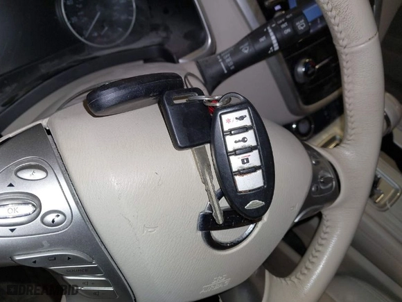2015 Nissan Murano Platinum with VIN 5N1AZ2MH7FN282814, listed as a IAAI auction lot 41719983 with 220,000 mi miles. Bid and sale history available at carsss.com. Image 11.