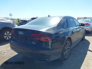 2017 Audi A8 L Sport with VIN WAU43AFD2HN000635, listed as a IAAI auction lot 41686835 with 91,203 mi miles. Bid and sale history available at carsss.com. Image 4.