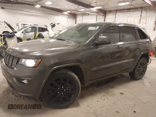 2018 Jeep Grand Cherokee Laredo E with VIN 1C4RJFAG6JC499261, listed as a IAAI auction lot 41033418 with 67,554 mi miles and . Bid and sale history available at DreamBid. Image 17.
