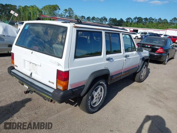 1994 Jeep Cherokee Sport with VIN 1J4FT68S7RL160652, listed as a IAAI auction lot 41992392 with 158,122 mi miles and . Bid and sale history available at DreamBid. Image 4.