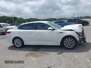 2018 Kia Optima LX with VIN 5XXGT4L34JG253597, listed as a IAAI auction lot 41915762 with 166,521 mi miles. Bid and sale history available at carsss.com. Image 13.