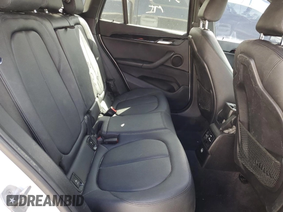 2018 BMW X1 sDrive28i with VIN WBXHU7C38J5H40248, listed as a Copart auction lot 66158662 with 59,903 mi miles. Bid and sale history available at carsss.com. Image 6.
