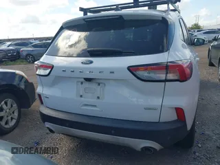 2020 Ford Escape SE z VIN 1FMCU0G68LUB44710, wystawiony jako IAAI lot #42545274 z przebiegiem Nie podano mil oraz . Historia ofert i sprzedaży dostępna na DreamBid. Obrazek 17.