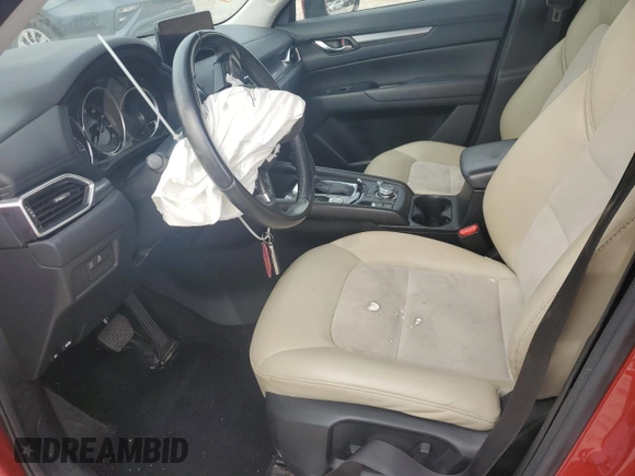 2021 Mazda CX-5 Touring with VIN JM3KFACM7M0334633, listed as a Copart auction lot 51618875 with 70,558 mi miles and Salvage Title. Bid and sale history available at DreamBid. Image 7.