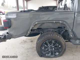 2022 Jeep Gladiator Overland with VIN 1C6HJTFG2NL114648, listed as a IAAI auction lot 41710064 with 62,453 mi miles. Bid and sale history available at carsss.com. Image 6.