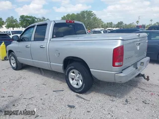 2002 Dodge Ram 1500 with VIN 3D7HA18N12G149575, listed as a IAAI auction lot 42082975 with 144,053 mi miles. Bid and sale history available at carsss.com. Image 3.