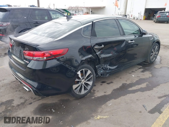 2016 Kia Optima SX Turbo with VIN 5XXGW4L2XGG052746, listed as a IAAI auction lot 41306792 with 69,571 mi miles and . Bid and sale history available at carsss.com. Image 4.