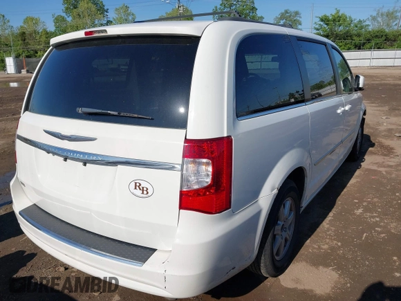 2013 Chrysler Town & Country Touring z VIN 2C4RC1BG4DR583845, wystawiony jako IAAI lot #42222236 z przebiegiem 178 875 mil mil oraz . Historia ofert i sprzedaży dostępna na DreamBid. Obrazek 4.
