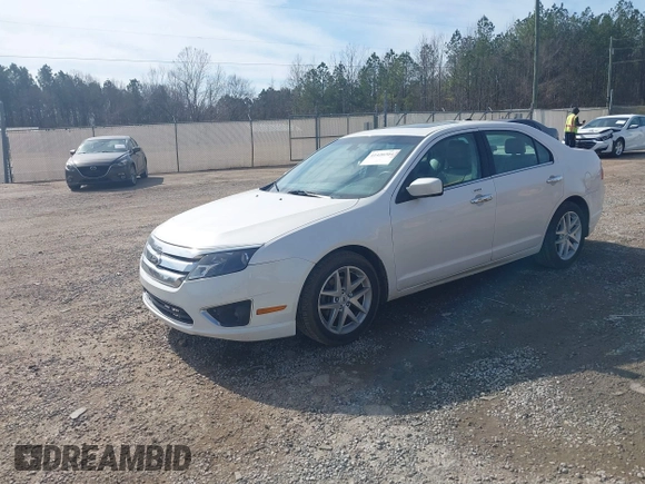 2012 Ford Fusion SEL z VIN 3FAHP0JAXCR412569, wystawiony jako IAAI lot #41420304 z przebiegiem 174 369 mil mil oraz . Historia ofert i sprzedaży dostępna na DreamBid. Obrazek 2.