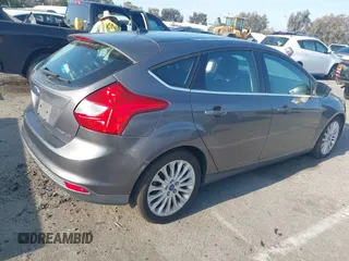 2012 Ford Focus Titanium with VIN 1FAHP3N22CL200249, listed as a IAAI auction lot 42149873 with 103,805 mi miles and . Bid and sale history available at carsss.com. Image 4.
