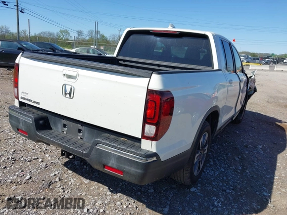 2017 Honda Ridgeline RTL with VIN 5FPYK2F55HB002455, listed as a IAAI auction lot 42032551 with 115,178 mi miles and . Bid and sale history available at DreamBid. Image 4.