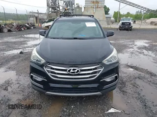 2017 Hyundai Santa Fe 2.4L z VIN 5NMZU3LB3HH011127, wystawiony jako IAAI lot #42369671 z przebiegiem 91 634 mil mil oraz . Historia ofert i sprzedaży dostępna na DreamBid. Obrazek 12.