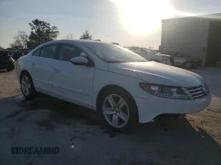 2017 Volkswagen CC Sport with VIN WVWKP7AN0HE501959, listed as a Copart auction lot 77133434 with 91,027 mi miles and Clean Title. Bid and sale history available at DreamBid. Image 4.