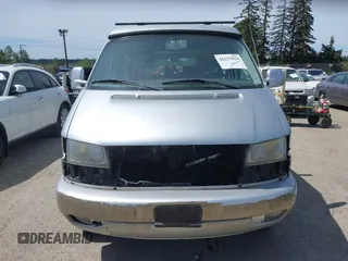 2003 Volkswagen EuroVan MV with VIN WV2NB47003H003131, listed as a IAAI auction lot 42157821 with 166,159 mi miles and . Bid and sale history available at DreamBid. Image 12.