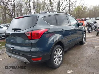 2019 Ford Escape SEL with VIN 1FMCU9HD3KUA54073, listed as a IAAI auction lot 41917955 with 101,283 mi miles. Bid and sale history available at carsss.com. Image 4.