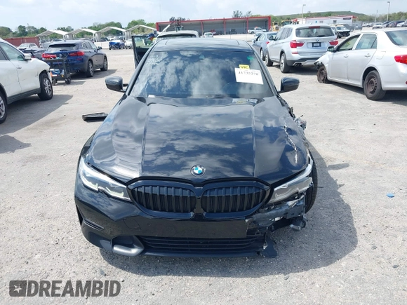 2021 BMW 3 Series 330i with VIN 3MW5R1J09M8B93600, listed as a IAAI auction lot 41735270 with 77,648 mi miles. Bid and sale history available at carsss.com. Image 12.