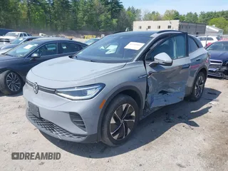 2022 Volkswagen ID.4 Pro S z VIN WVGGNPE24NP059968, wystawiony jako IAAI lot #42210089 z przebiegiem 36 860 mil mil oraz . Historia ofert i sprzedaży dostępna na DreamBid. Obrazek 17.