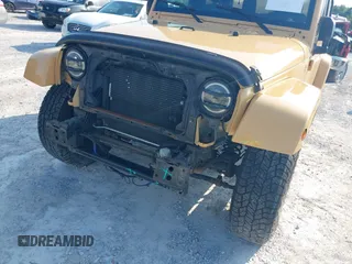 2013 Jeep Wrangler Arctic z VIN 1C4GJWBG2DL634942, wystawiony jako IAAI lot #42373239 z przebiegiem 131 470 mil mil oraz . Historia ofert i sprzedaży dostępna na DreamBid. Obrazek 6.