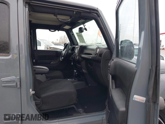 2014 Jeep Wrangler Unlimited Sport with VIN 1C4BJWDG4EL319259, listed as a IAAI auction lot 41494299 with 141,699 mi miles. Bid and sale history available at carsss.com. Image 5.