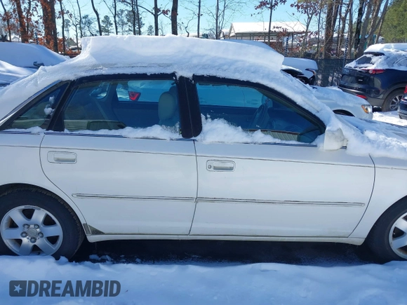 2001 Toyota Avalon XL z VIN 4T1BF28B31U159772, wystawiony jako IAAI lot #41622587 z przebiegiem 175 456 mil mil oraz . Historia ofert i sprzedaży dostępna na DreamBid. Obrazek 13.