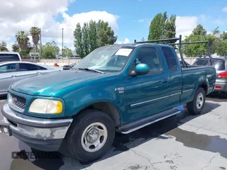 1998 Ford F-150 with VIN 1FTZX1760WKA90900, listed as a IAAI auction lot 42239510 with 198,405 mi miles and . Bid and sale history available at DreamBid. Image 6.