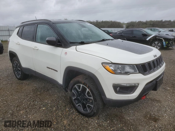 2019 Jeep Compass Trailhawk with VIN 3C4NJDDB4KT790351, listed as a Copart auction lot 48588285 with 67,417 mi miles and Salvage Title. Bid and sale history available at DreamBid. Image 4.