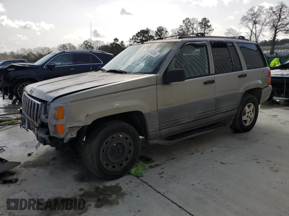 1998 Jeep Grand Cherokee Laredo with VIN 1J4FX58S1WC130492, listed as a Copart auction lot 47656265 with 0 mi miles and Salvage Title. Bid and sale history available at carsss.com. Image 1.