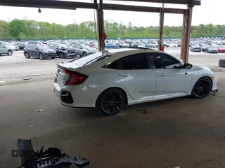 2020 Honda Civic Si z VIN 2HGFC1E52LH702933, wystawiony jako IAAI lot #42241093 z przebiegiem 73 026 mil mil oraz . Historia ofert i sprzedaży dostępna na DreamBid. Obrazek 4.