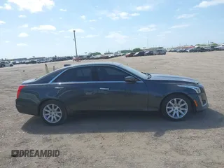 2016 Cadillac CTS Sedan Luxury Collection RWD with VIN 1G6AR5SXXG0101948, listed as a IAAI auction lot 41824836 with 91,225 mi miles. Bid and sale history available at carsss.com. Image 14.