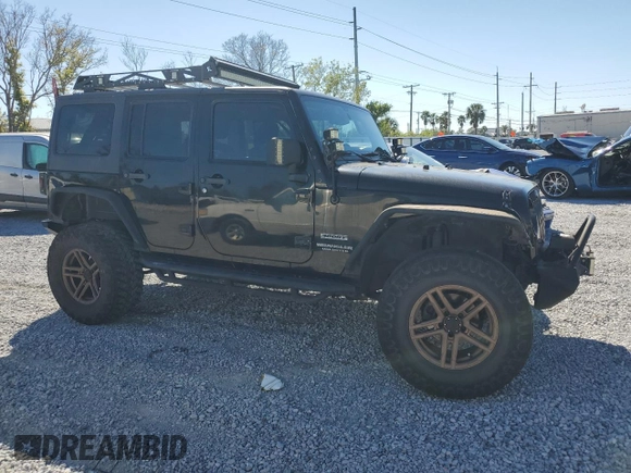 2014 Jeep Wrangler Unlimited Sport with VIN 1C4BJWDGXEL269693, listed as a Copart auction lot 46927895 with 105,691 mi miles and Salvage Title. Bid and sale history available at carsss.com. Image 4.