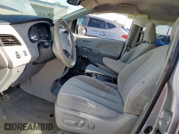 2014 Toyota Sienna LE AAS with VIN 5TDKK3DCXES518968, listed as a Copart auction lot 59553905 with 176,074 mi miles and Salvage title. Bid and sale history available at DreamBid. Image 7.