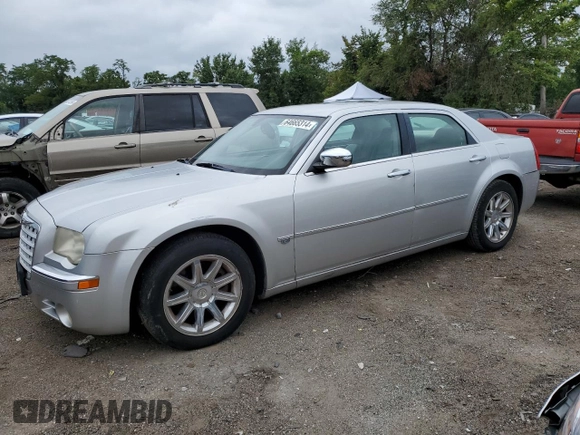 2006 Chrysler 300 C with VIN 2C3LA63H06H527558, listed as a Copart auction lot 64665314 with 74,237 mi miles and Salvage Title. Bid and sale history available at carsss.com. Image 1.