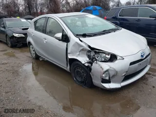 2014 Toyota Prius c One with VIN JTDKDTB37E1568298, listed as a IAAI auction lot 41464191 with 61,707 mi miles. Bid and sale history available at carsss.com. Image 1.