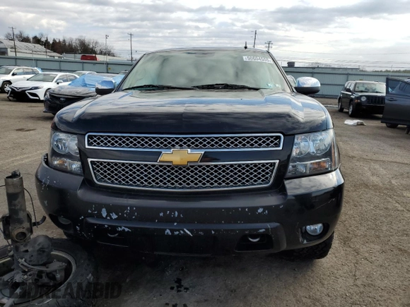 2012 Chevrolet Tahoe LTZ with VIN 1GNSKCE08CR322969, listed as a Copart auction lot 50604555 with 165,190 mi miles and Salvage title. Bid and sale history available at DreamBid. Image 5.