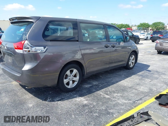 2012 Toyota Sienna with VIN 5TDZK3DC8CS190719, listed as a IAAI auction lot 41983695 with 68,377 mi miles and . Bid and sale history available at DreamBid. Image 4.