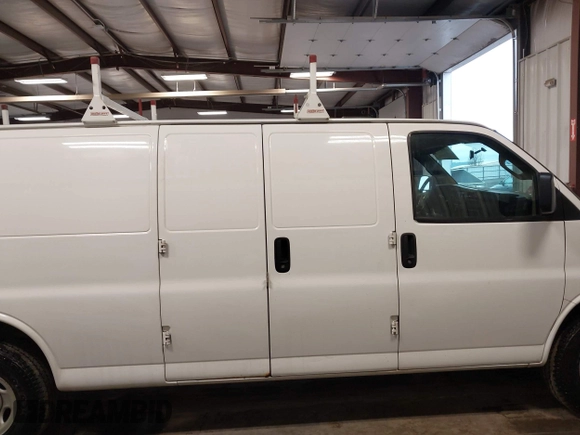 2017 Chevrolet Express Cargo Van with VIN 1GCWGBFF3H1186362, listed as a IAAI auction lot 41943220 with 163,229 mi miles. Bid and sale history available at carsss.com. Image 13.