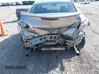 2010 Mazda 3 S Grand Touring with VIN JM1BL1S50A1350853, listed as a IAAI auction lot 41684024 with 149,842 mi miles and . Bid and sale history available at carsss.com. Image 6.