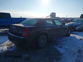 2005 Chrysler 300 with VIN 2C3AA63H65H526016, listed as a IAAI auction lot 41296420 with 136,794 mi miles. Bid and sale history available at carsss.com. Image 4.