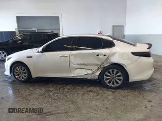 2016 Kia Optima SX Turbo with VIN 5XXGW4L23GG016526, listed as a IAAI auction lot 41428139 with 112,603 mi miles and . Bid and sale history available at carsss.com. Image 14.