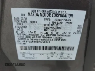 2006 Mazda Tribute S with VIN 4F2YZ06186KM08378, listed as a Copart auction lot 69391894 with Not Provided miles and Salvage Title. Bid and sale history available at DreamBid. Image 16.