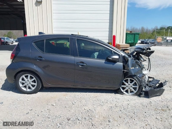 2015 Toyota Prius c One with VIN JTDKDTB31F1096438, listed as a IAAI auction lot 41859685 with 208,302 mi miles. Bid and sale history available at carsss.com. Image 13.