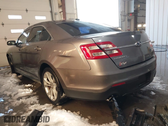 2013 Ford Taurus SEL z VIN 1FAHP2E89DG150197, wystawiony jako IAAI lot #41214999 z przebiegiem 146 307 mil mil oraz . Historia ofert i sprzedaży dostępna na DreamBid. Obrazek 3.