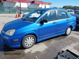 2003 Suzuki Aerio S z VIN JS2RA41SX35171394, wystawiony jako IAAI lot #40612266 z przebiegiem 70 127 mil mil oraz . Historia ofert i sprzedaży dostępna na DreamBid. Obrazek 2.