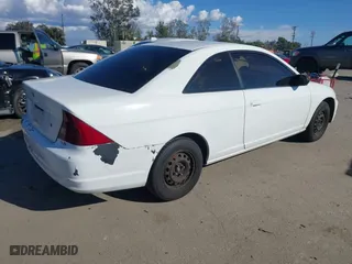 2002 Honda Civic LX with VIN 1HGEM22532L035360, listed as a IAAI auction lot 41759486 with 264,416 mi miles. Bid and sale history available at carsss.com. Image 4.