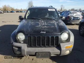 2003 Jeep Liberty Sport with VIN 1J4GK48KX3W658457, listed as a Copart auction lot 41863855 with 194,747 mi miles and Salvage Title. Bid and sale history available at DreamBid. Image 5.